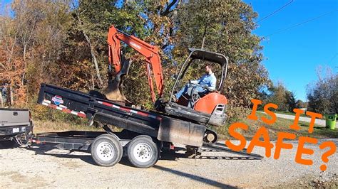 loading mini excavator in dump trailer|mini excavator tie down requirements.